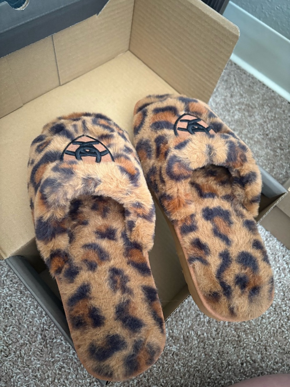 Ariat Leopard Print Fuzzy Slippers in Brown and Black